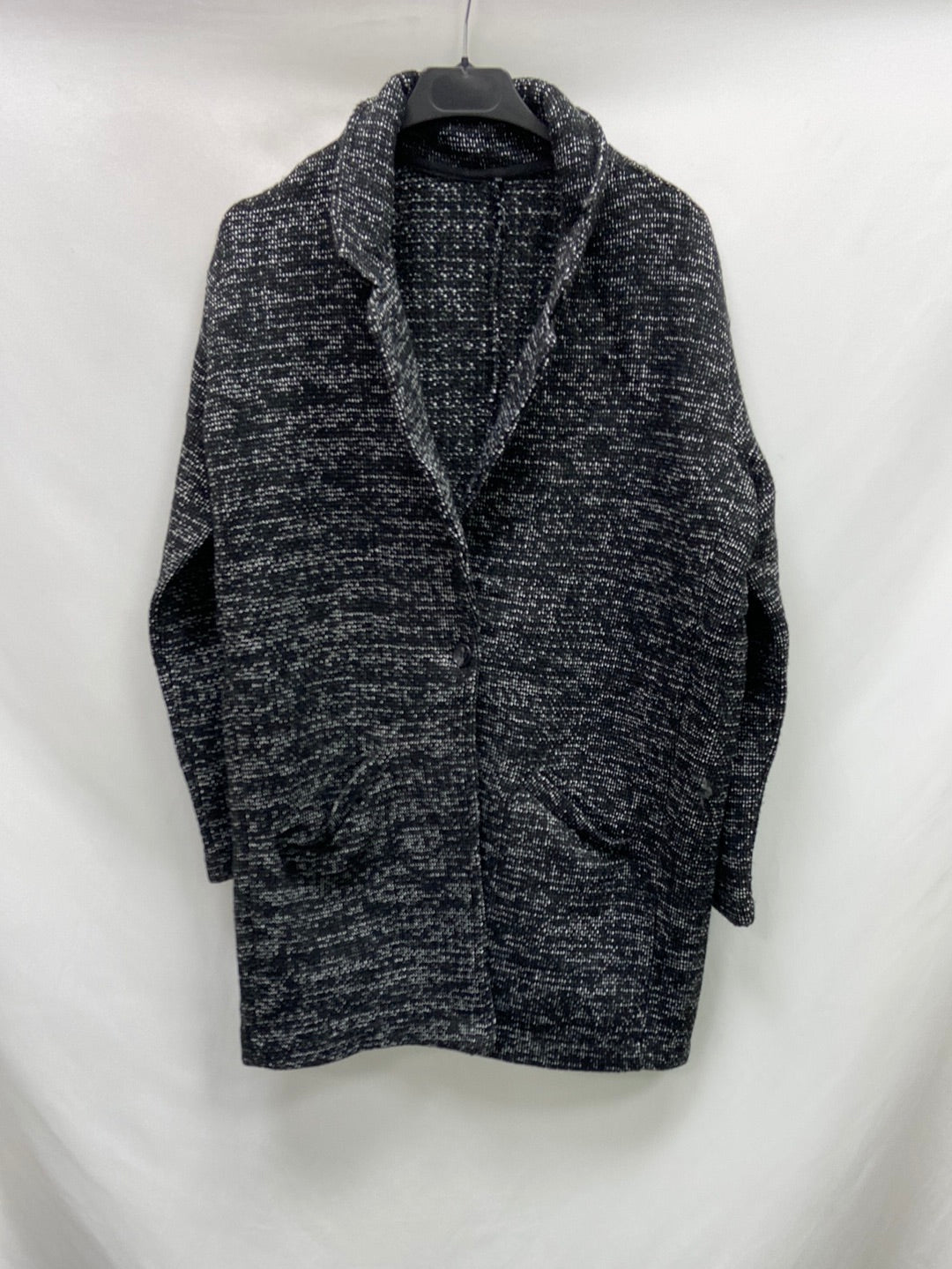 OTRAS.Blazer jaspeada negra T.S