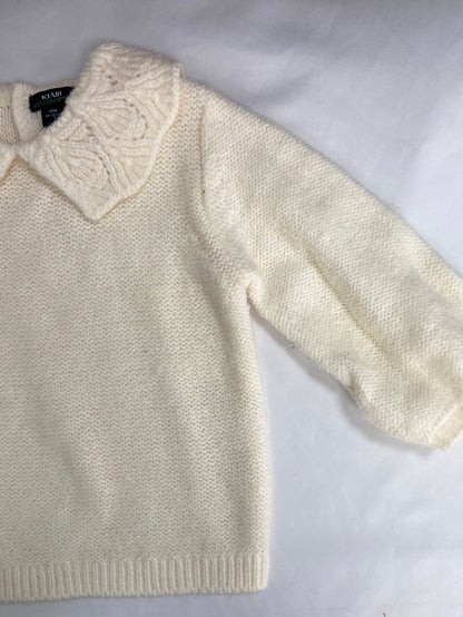 KIABI.Jersey beige cuello 9 meses