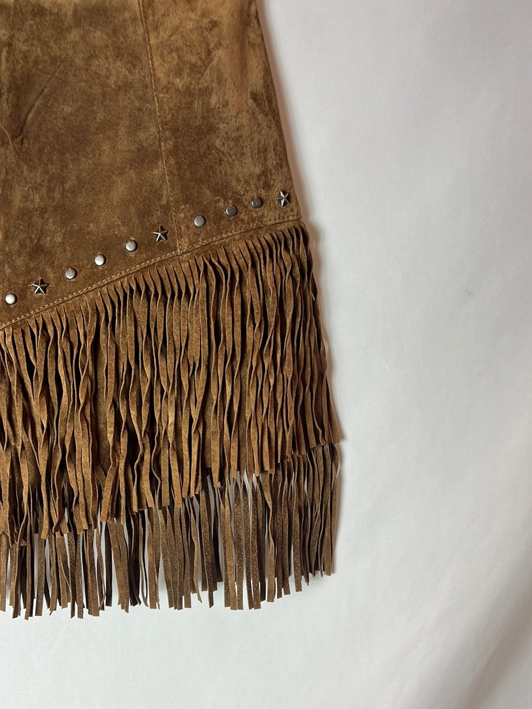 ZARA. Falda piel flecos T.xs