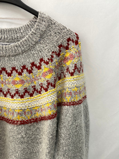 PULL&BEAR.Jersey gris dibujo T.M