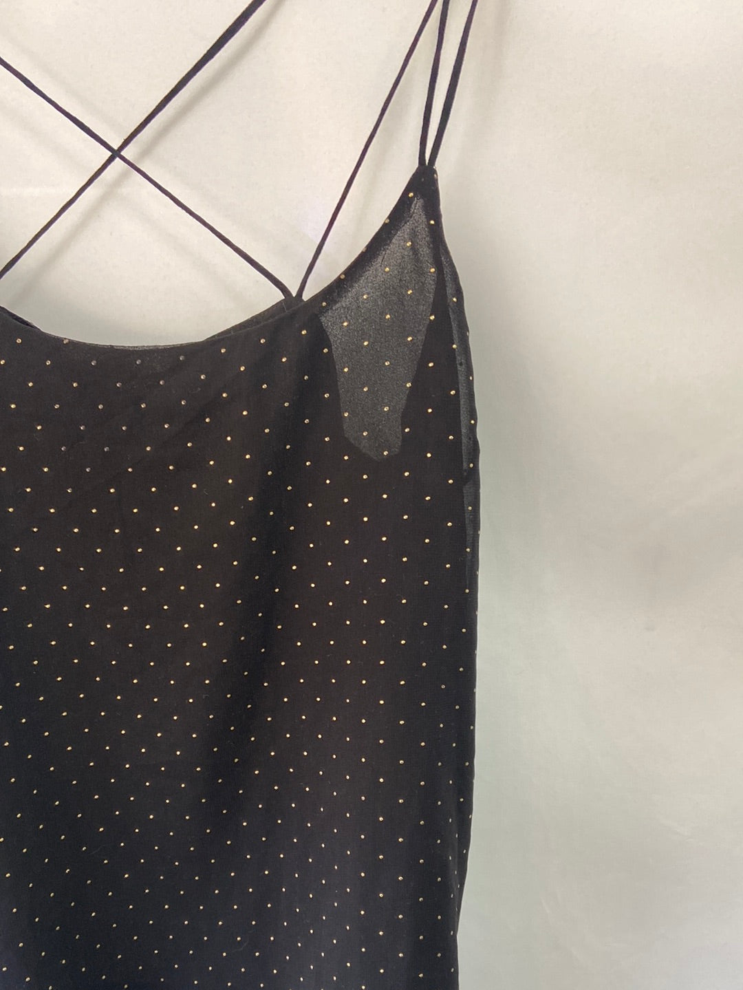 LEFTIES. Black top with mini gold studs.