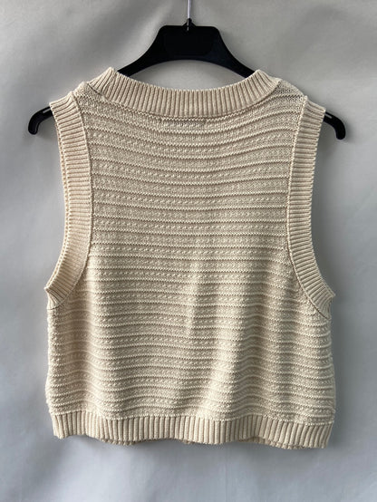 STRADIVARIUS.Top punto beige  T.M