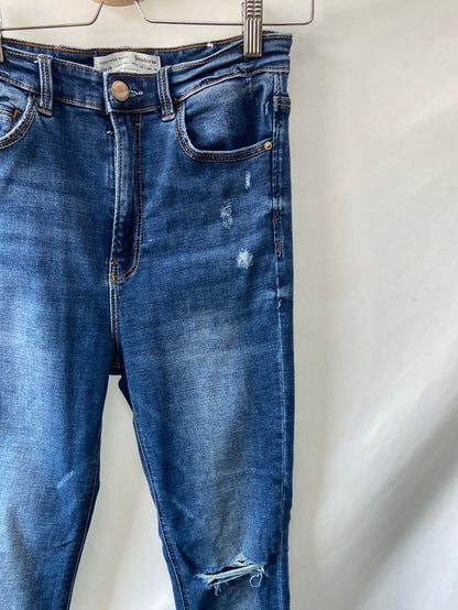 STRADIVARIUS.Pantalones vaqueros cintura alta T.38