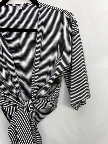 WANNA THIS. Striped knotted blouse Ts