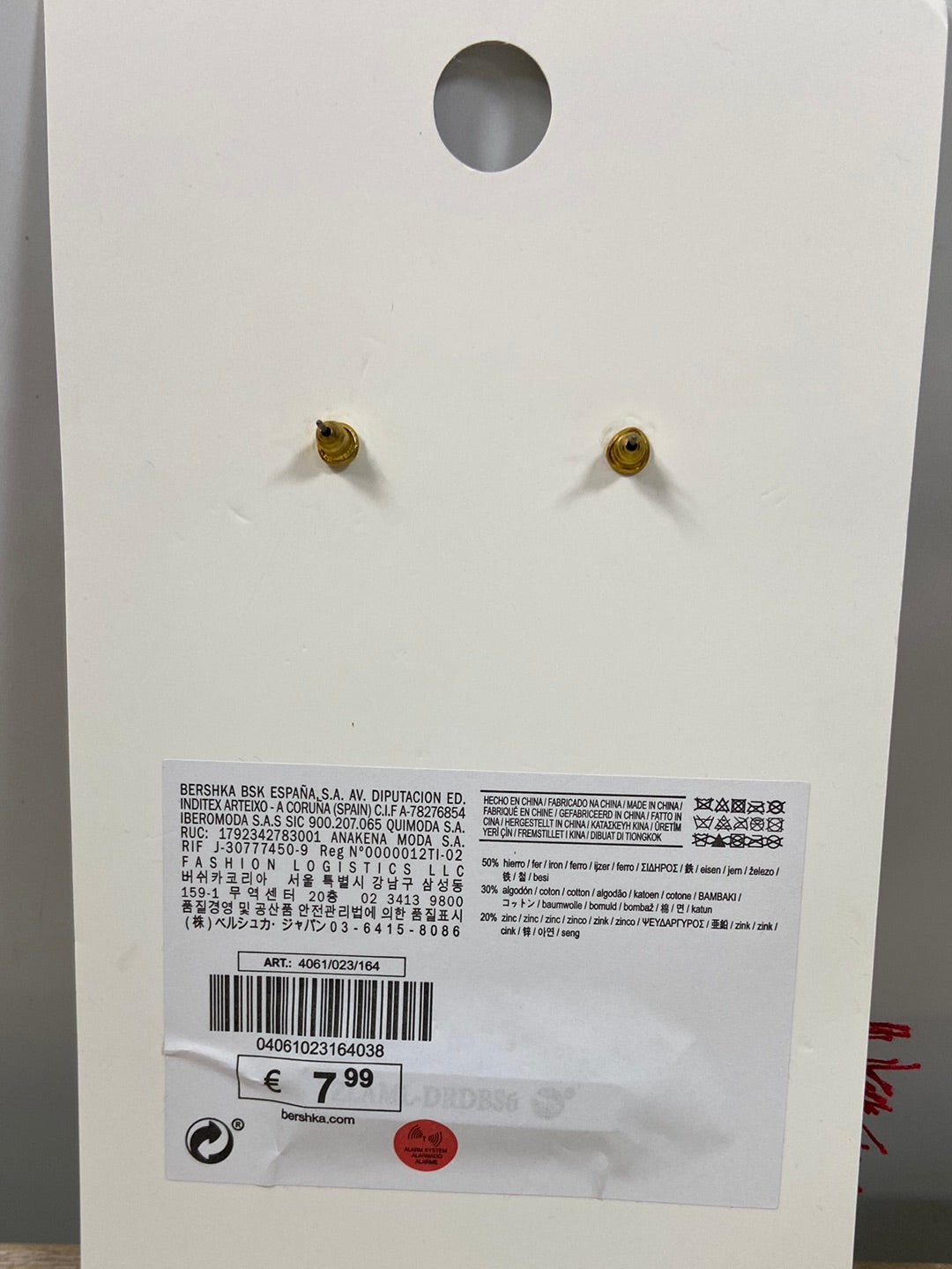 BERSHKA.Pendientes maxi flecos