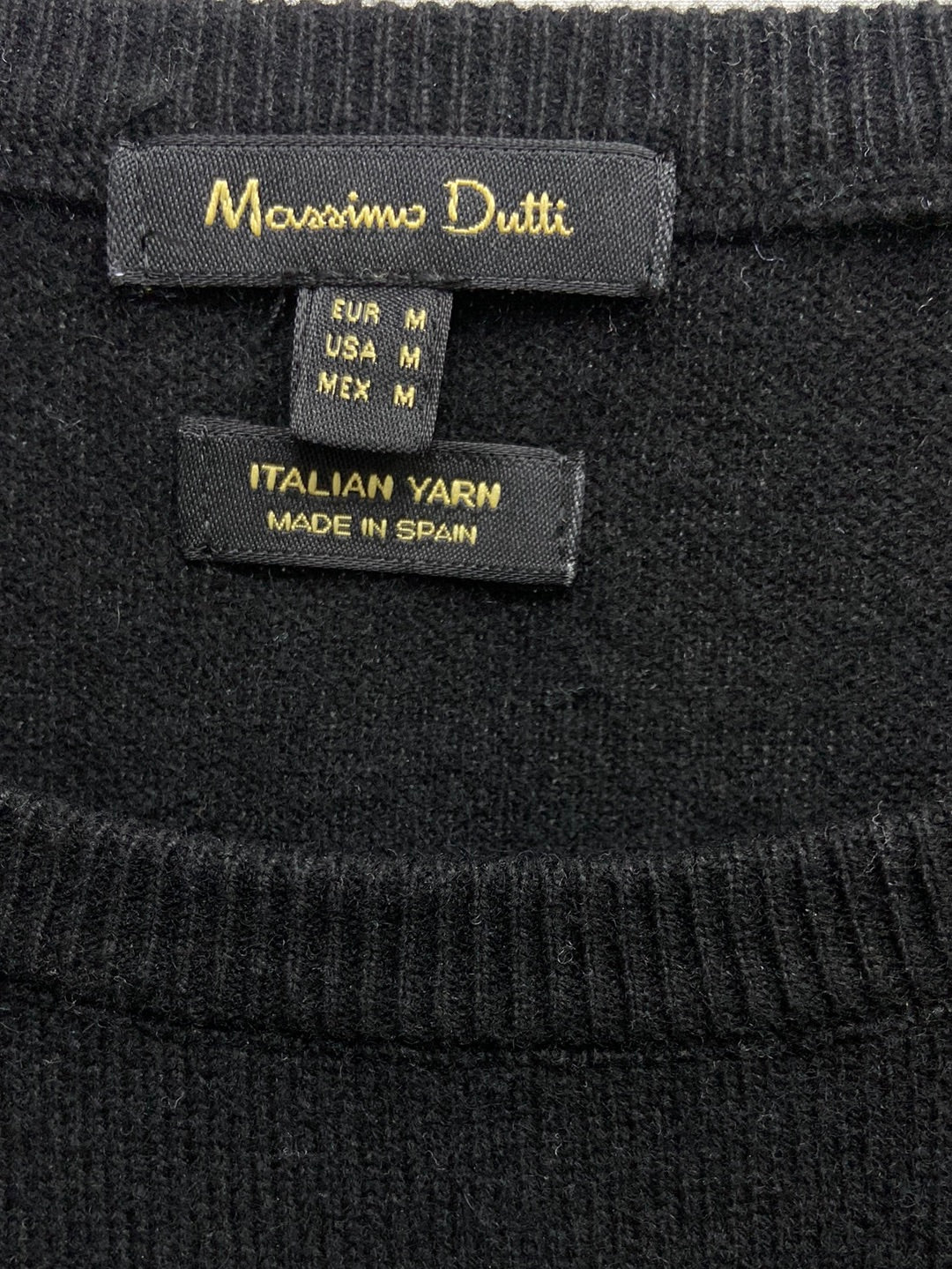 MASSIMO DUTTI. Jersey negro volantes T.m