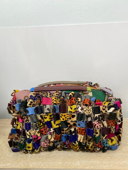 OTRAS.Bolso de piel multiestampado