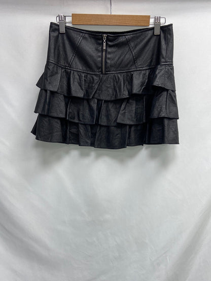 WHITE. Black ruffled skirt size 34