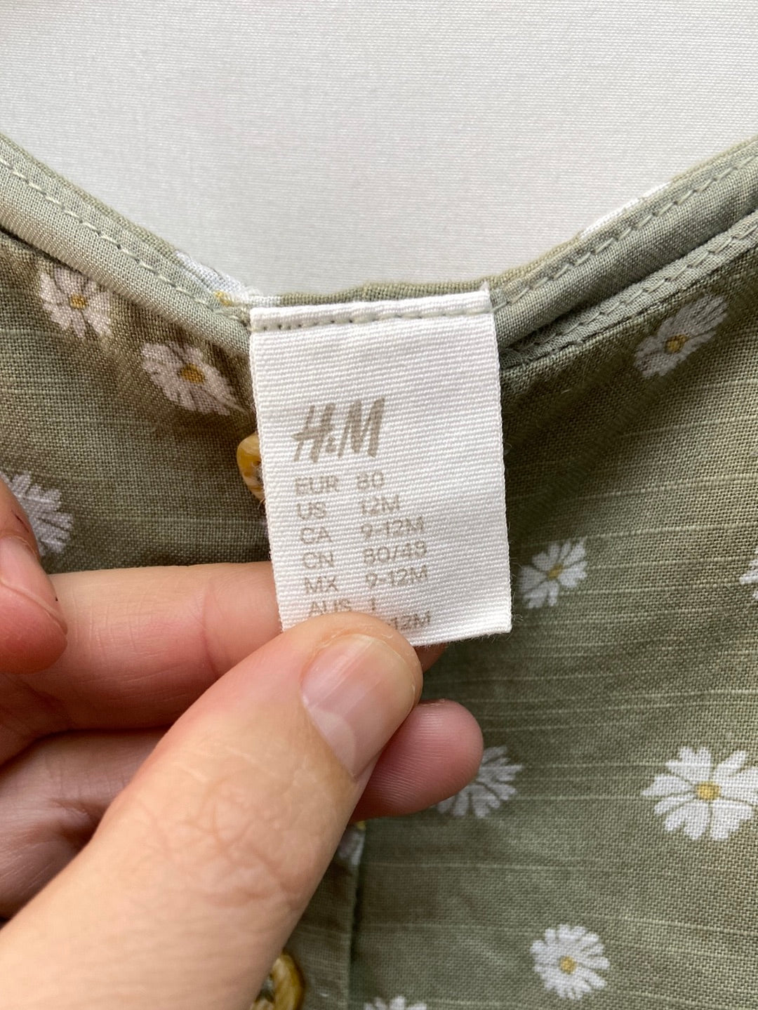 H&M.Peto flores 9-12 meses