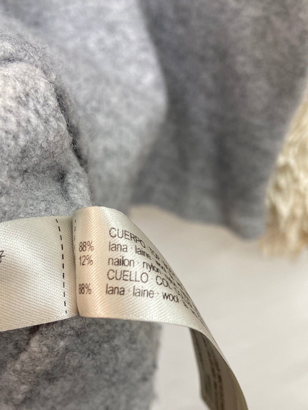 UTERQÜE.Jersey bicolor flecos T.S/M (Tara)