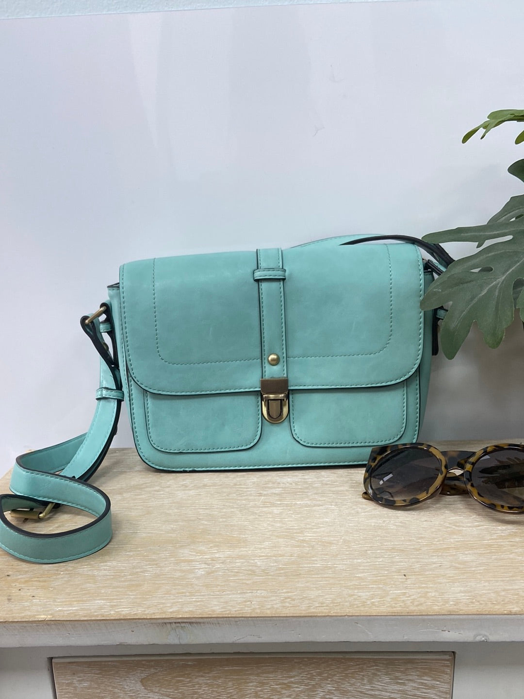 MISAKO. Medium turquoise blue crossbody bag