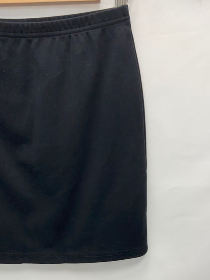 OTRAS.Falda corta negra elástica T.s