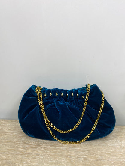 OTRAS.Bolso azul terciopelo