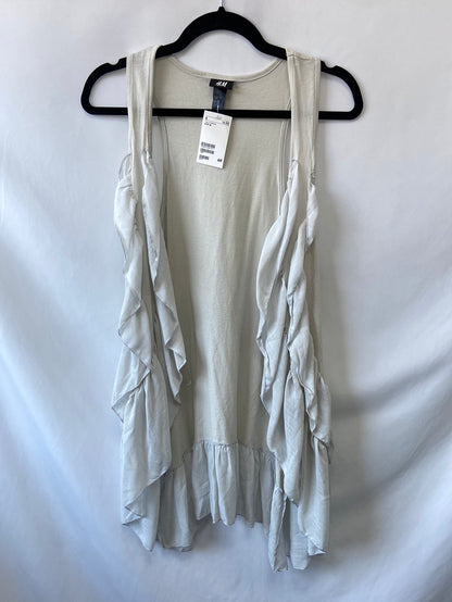 H&M. Chaleco beige volantes T.M