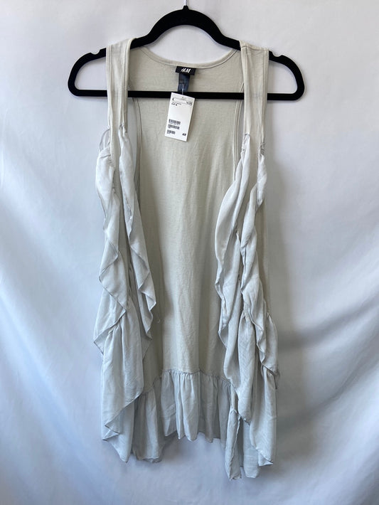 H&M. Chaleco beige volantes T.M