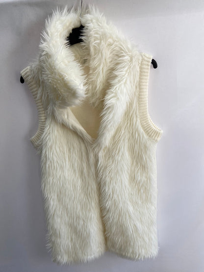 OTRAS.Chaleco blanco roto pelo y punto T.M