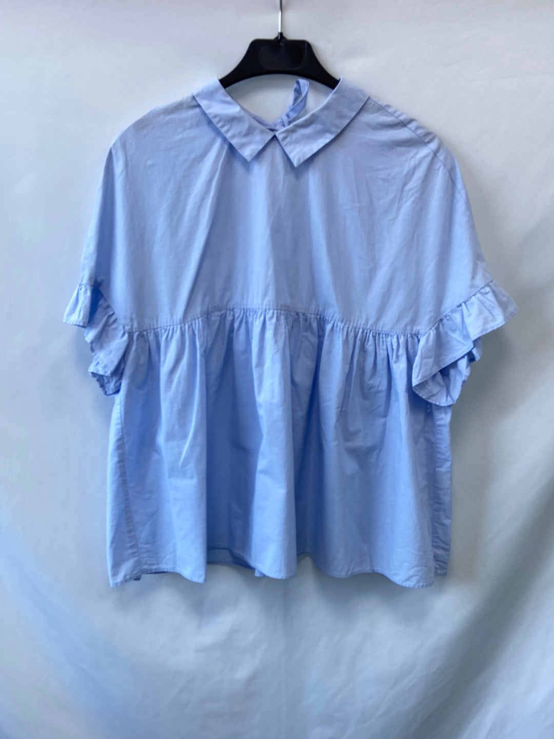 ZARA.Blusa azul volante T.M (Tara)