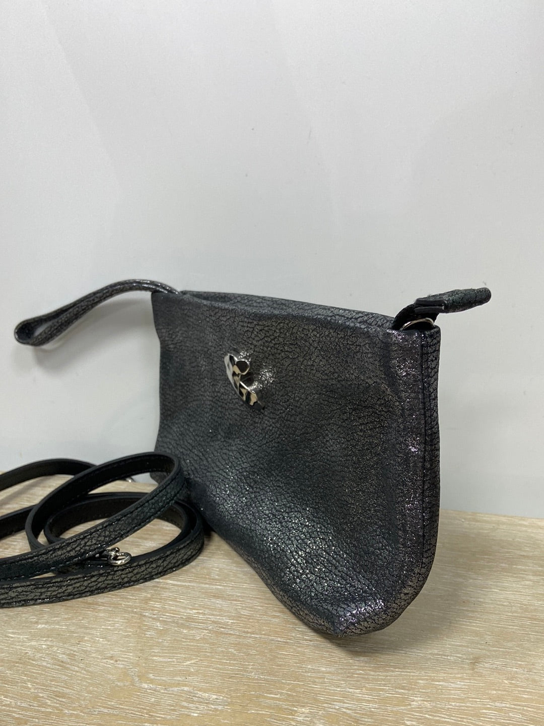 TOUS. Bolso de mano plateado