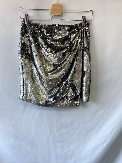 SFERA. Falda corta lentejuelas T.s