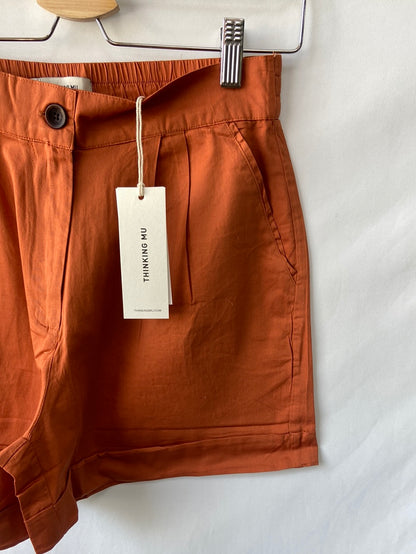 THINKING MU. Shorts fluido teja T.s