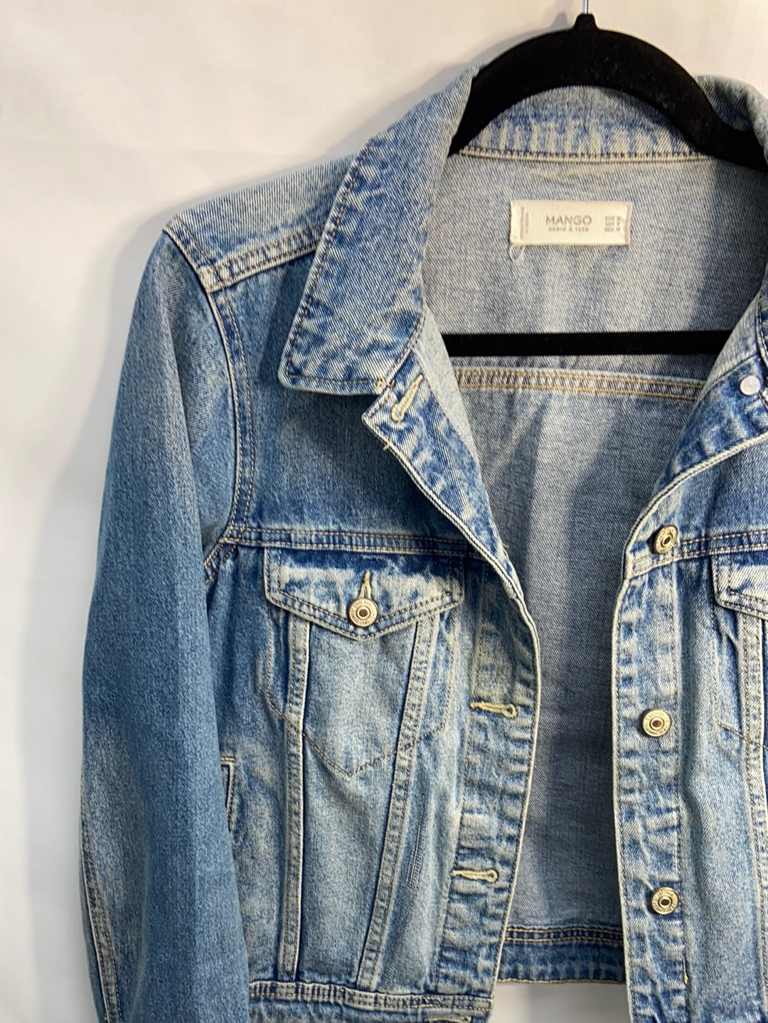 MANGO. Short distressed denim jacket TM