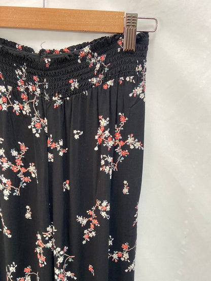 OTRAS.Pantalones fluidos negros T. xs/s