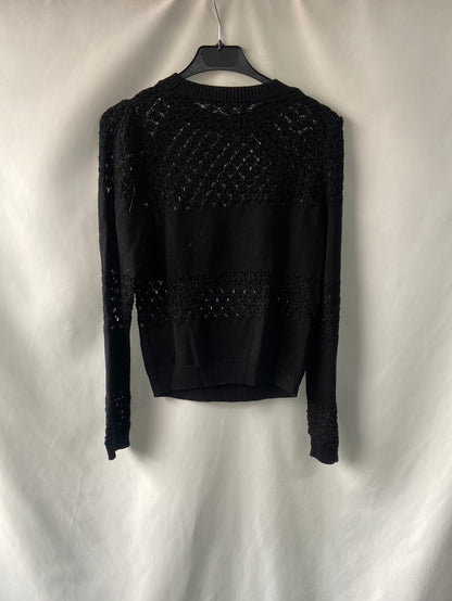 SCALPERS.Jersey negro troquelado T.s