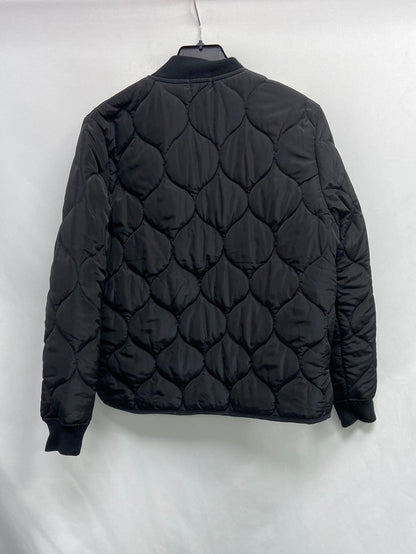 TERIA YABAR.Plumas negro ligero T.M