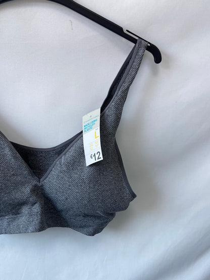 PRIMARK.Top deportivo gris T.L