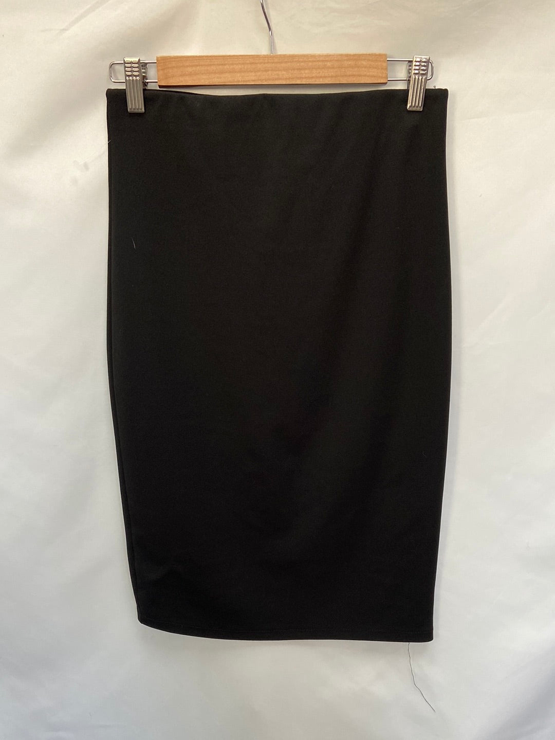 MUNMO.Falda tubo elástica negra midi T.m