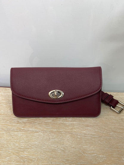 ZARA.Riñonera burdeos