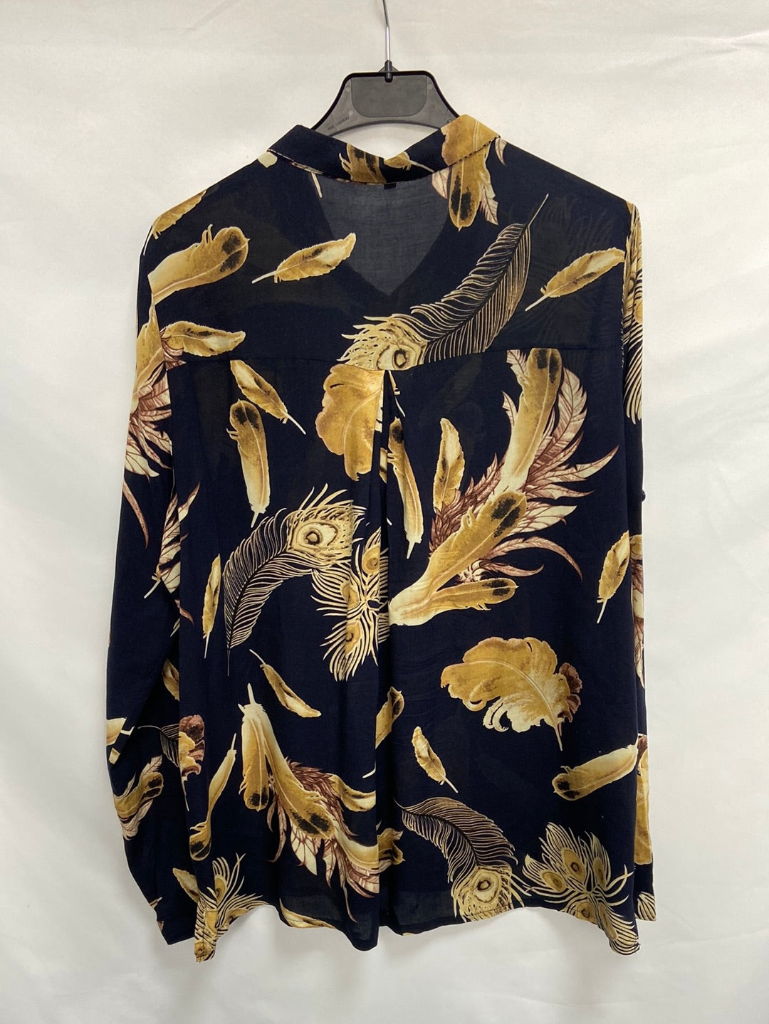 OTRAS.Blusa oversized plumas T.XL