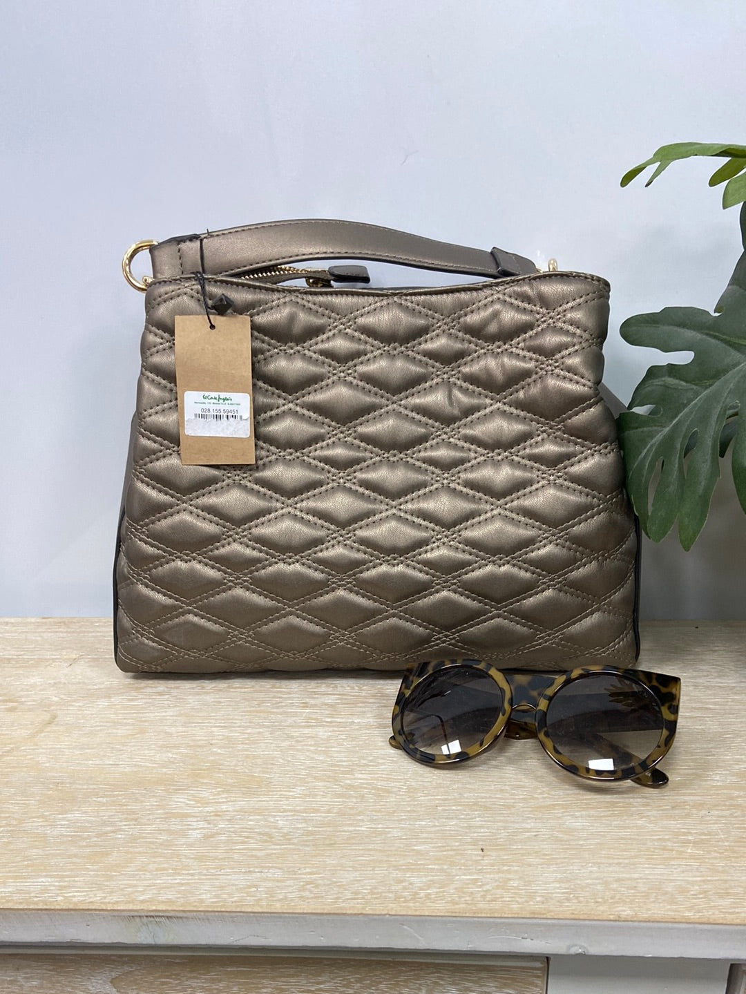 ECI. Quilted bronze bag