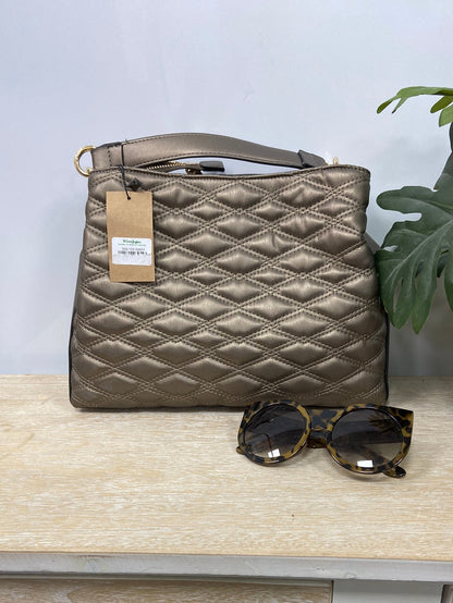 ECI. Quilted bronze bag