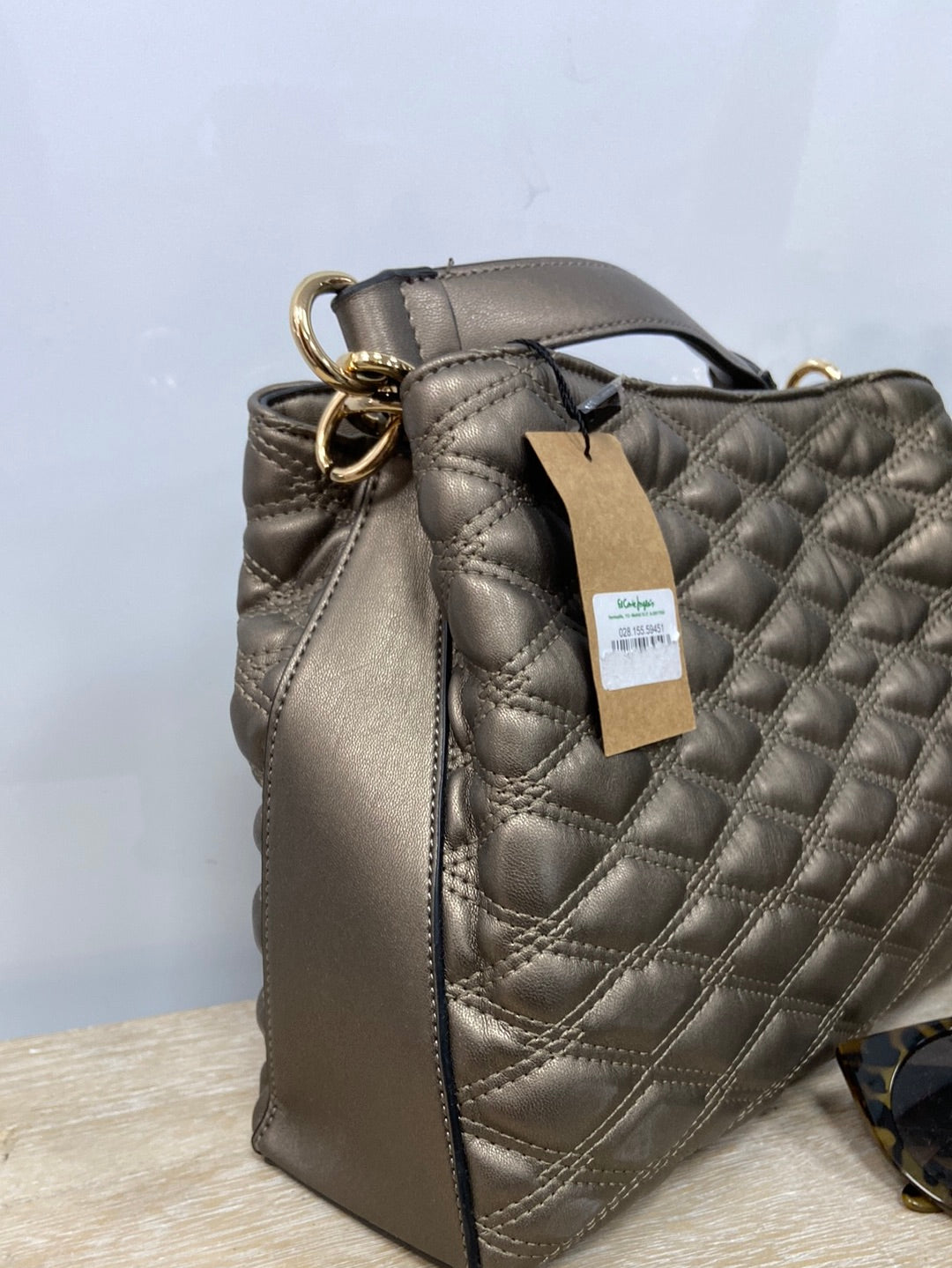 ECI. Quilted bronze bag