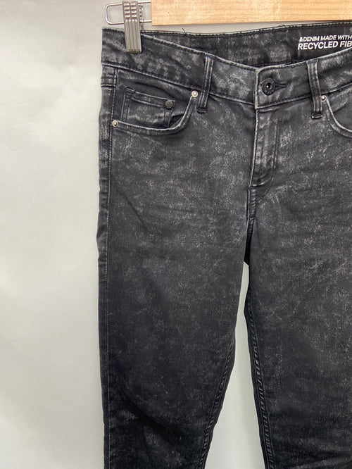 H&M.Pantalones grises efectuó lavado T.36