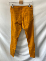 ZARA. Pantalones clásicos mostaza T.38