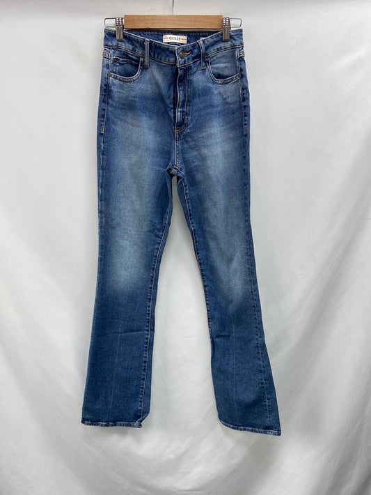 GUESS.Vaqueros modelo "sky high boot" T.s