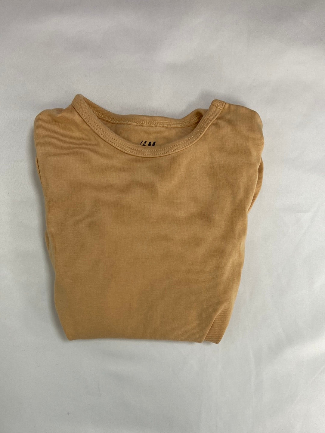 H&amp;M.Body pastel mustard 9-12 months