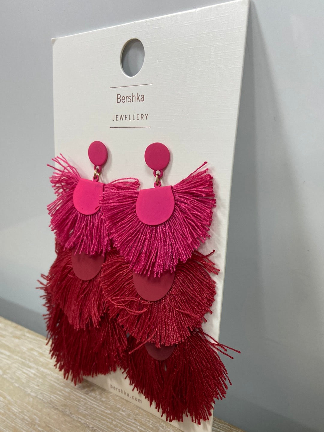 BERSHKA.Pendientes maxi flecos