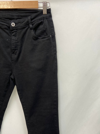 OTRAS.vaqueros negros flecos T.38