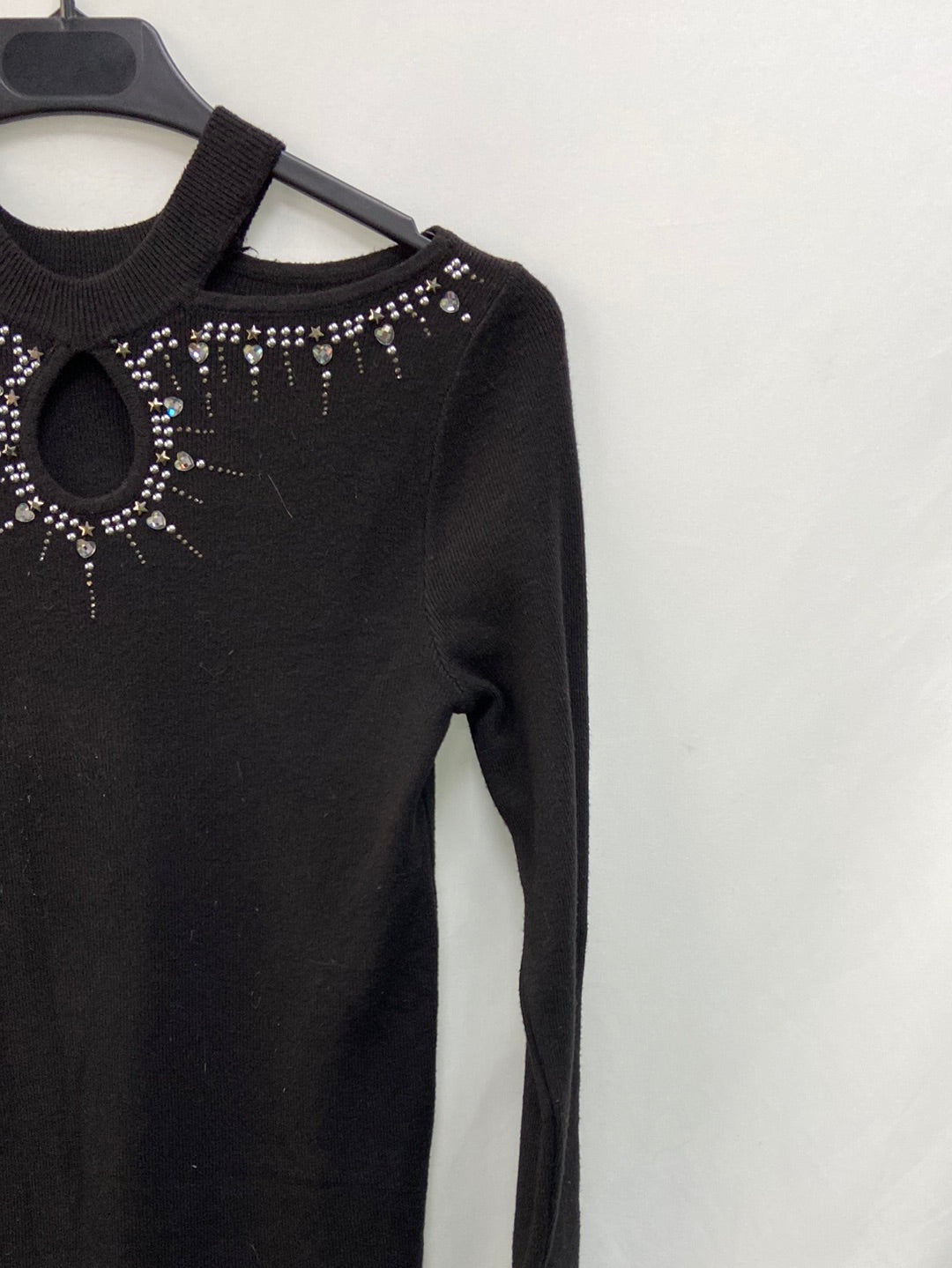 KATELINA.Jersey negro aberturas tachuelas T.L/XL (S)