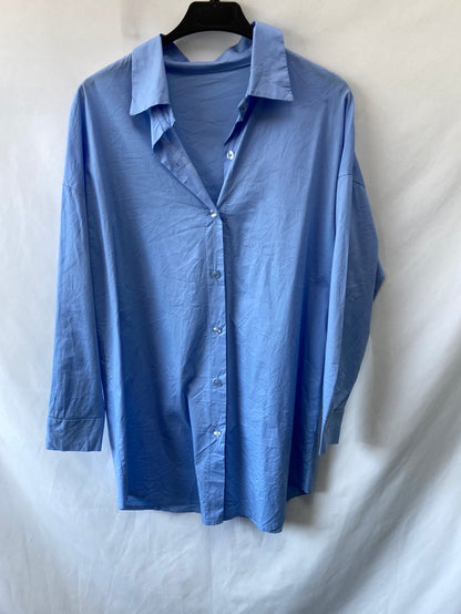 OTRAS.Camisa azul oversized T.s