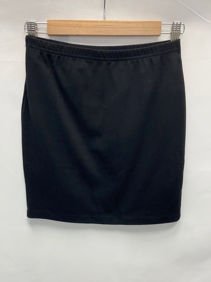 OTRAS.Falda corta negra elástica T.s
