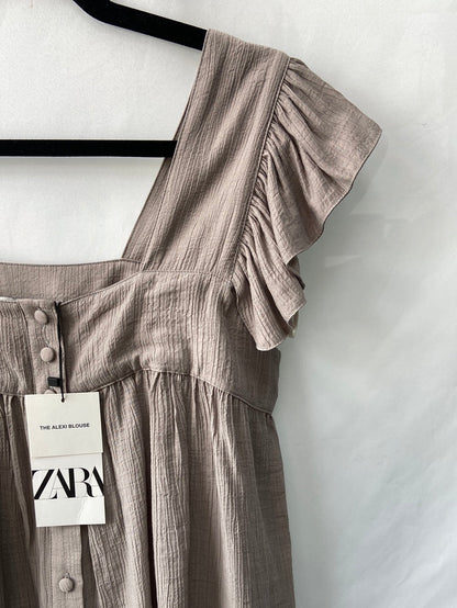 ZARA.Top beige grisáceo T.M