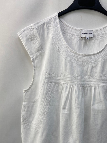 BIMBA Y LOLA. top blanco bordado T.M