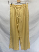 H&M.Pantalones fluidos amarillo pastel T.34