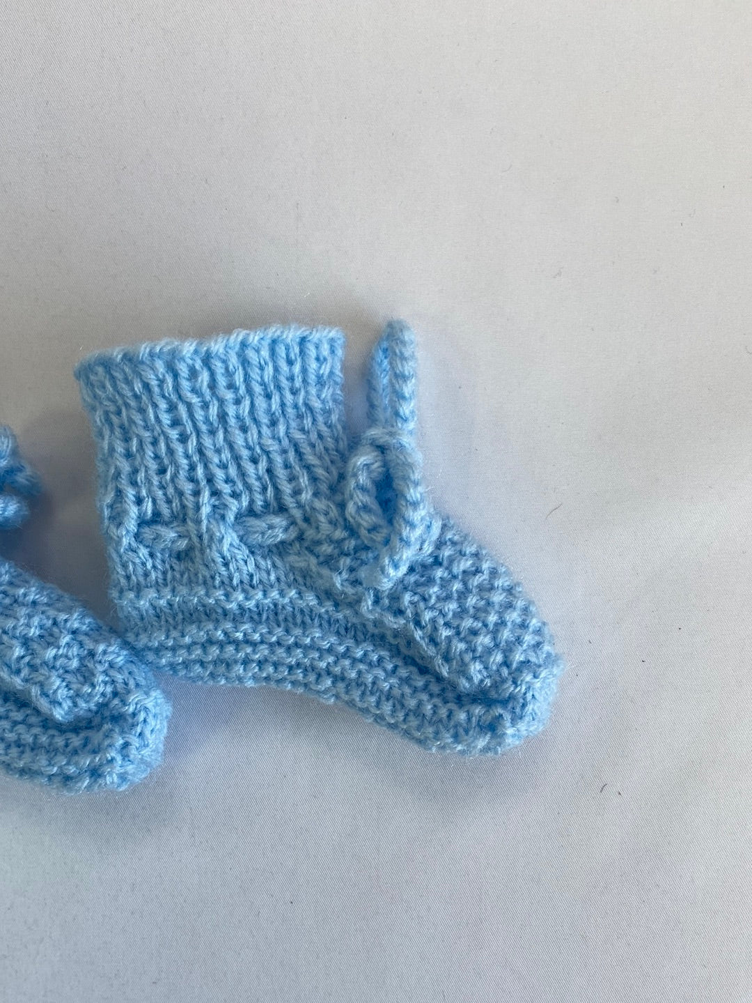 OTRAS. patucos azul punto T.9cm