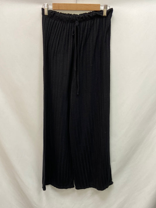 OTRAS.Pantalones canalé negros T.M/L