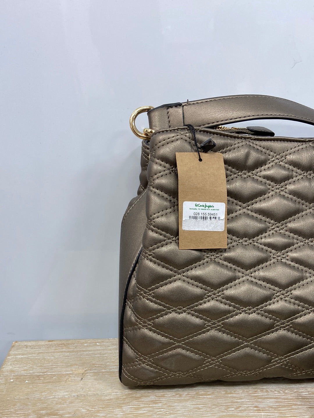 ECI. Quilted bronze bag